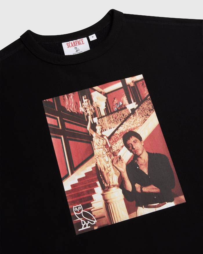 A black crewneck with a colour photo of Tony Montana (Al Pacino) smoking a cigar.