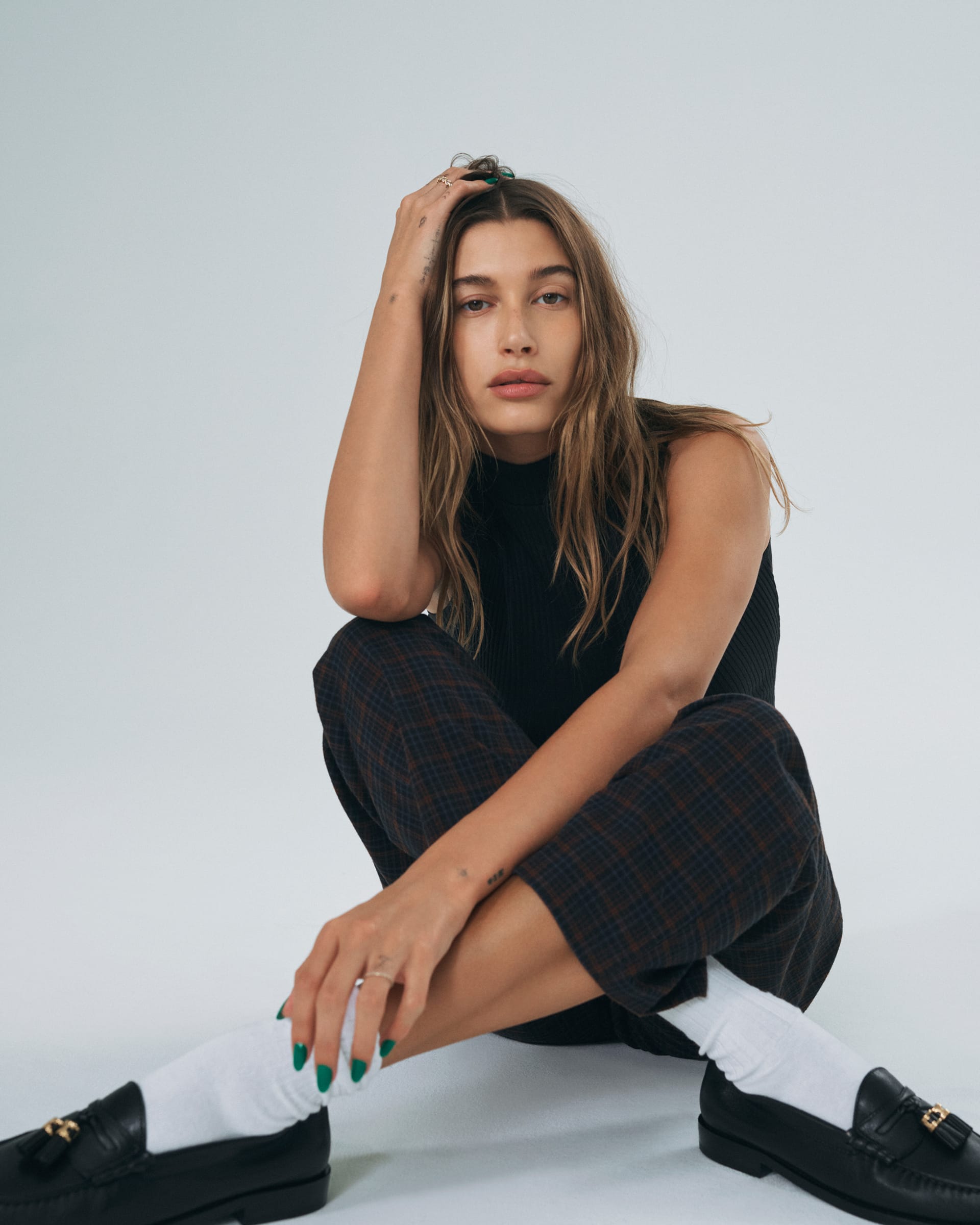 Hailey Bieber posing for Levis 2021 holiday campaign.