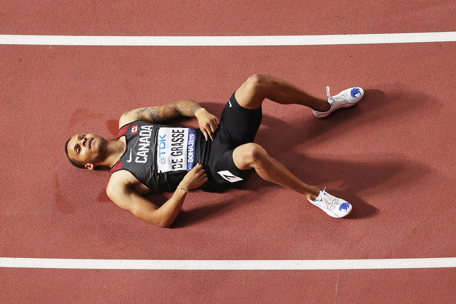 Andre De Grasse wearing his custom PUMA Sonic the Hedgehog shoes