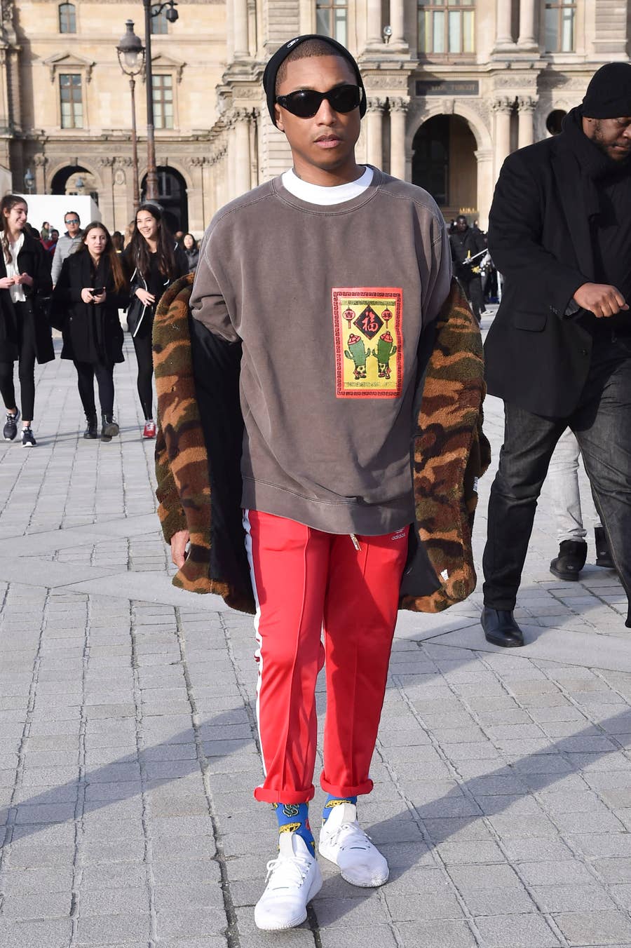 Pharell Flaunts Louis Vuitton 'Millionaire' Bag in Paris Fashion Week