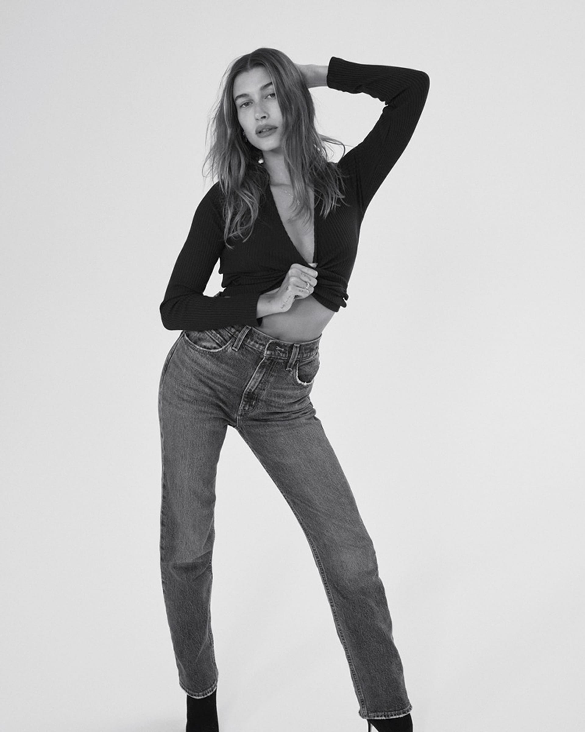 Hailey Bieber posing for Levis 2021 holiday campaign.