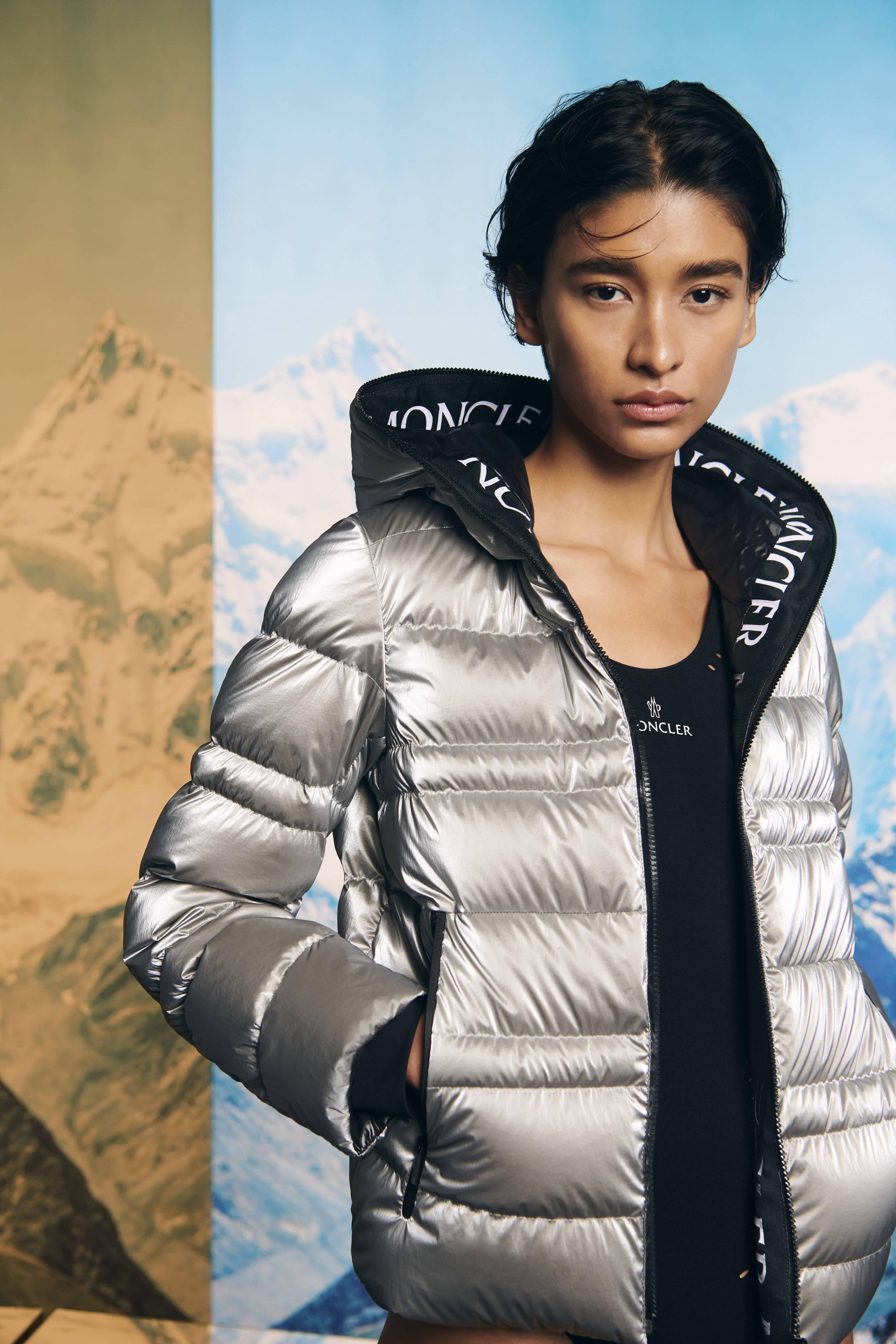 A Moncler model is shown.