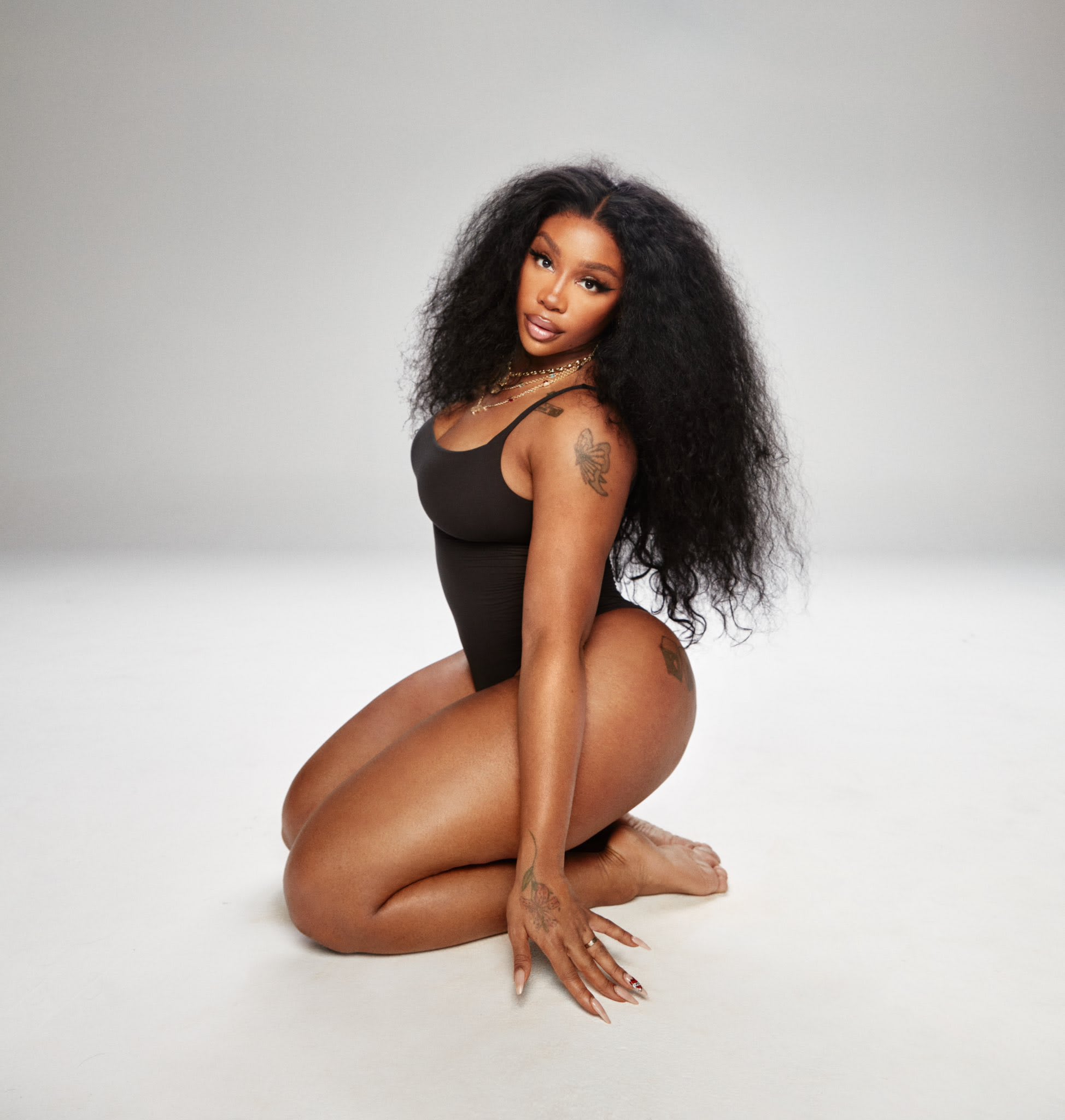 Kim Kardashian Dubs SZA 'Woman Of The Moment' For SKIMS Campaign
