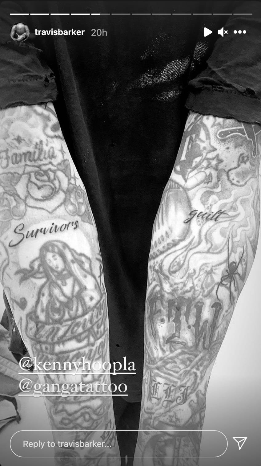 Travis Barker shows off tattoo that reads &#x27;Survivors guilt&#x27; on his left and right forearms.