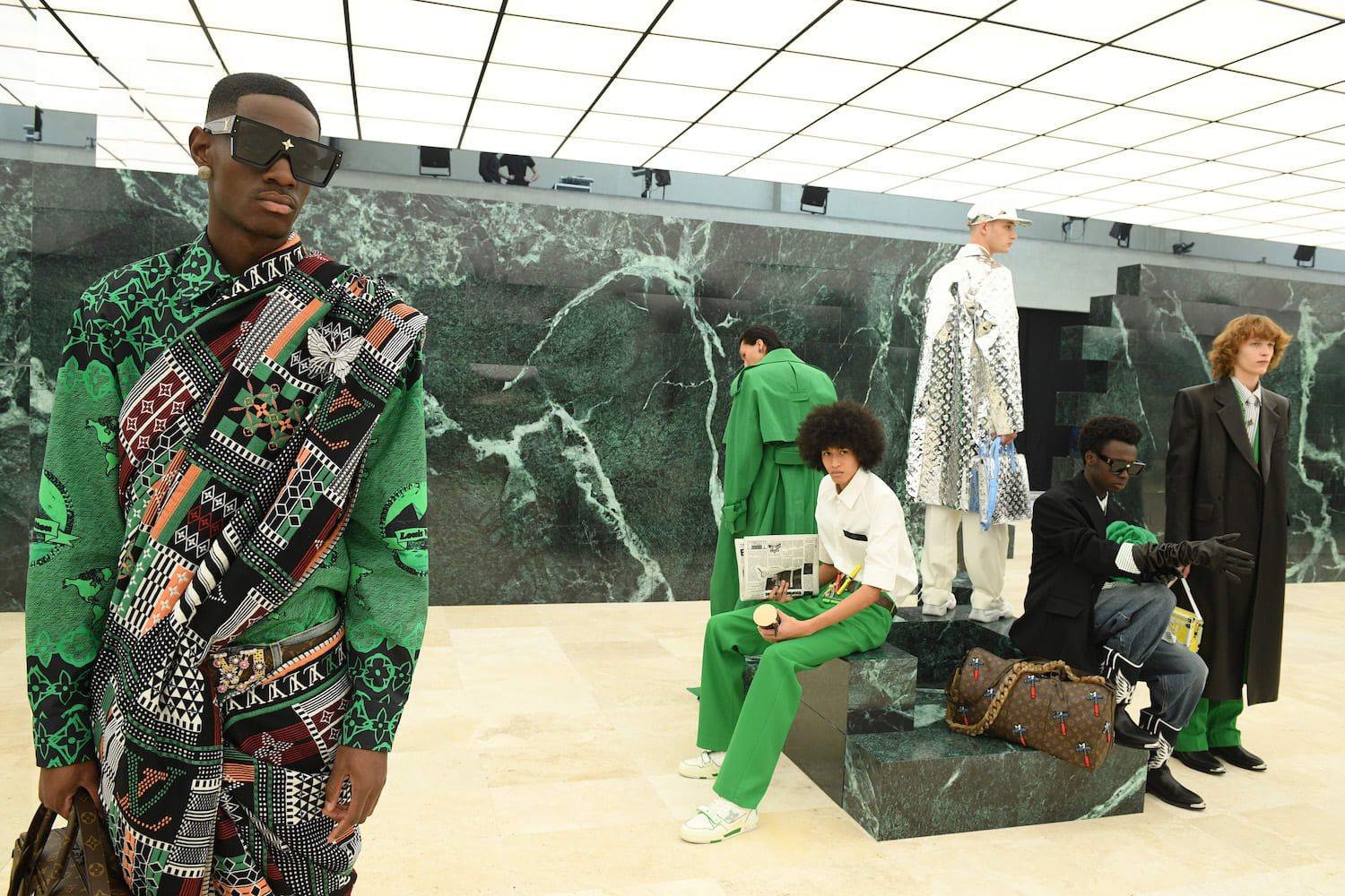 Pharrell Williams wearing Louis Vuitton Millionaires bag at