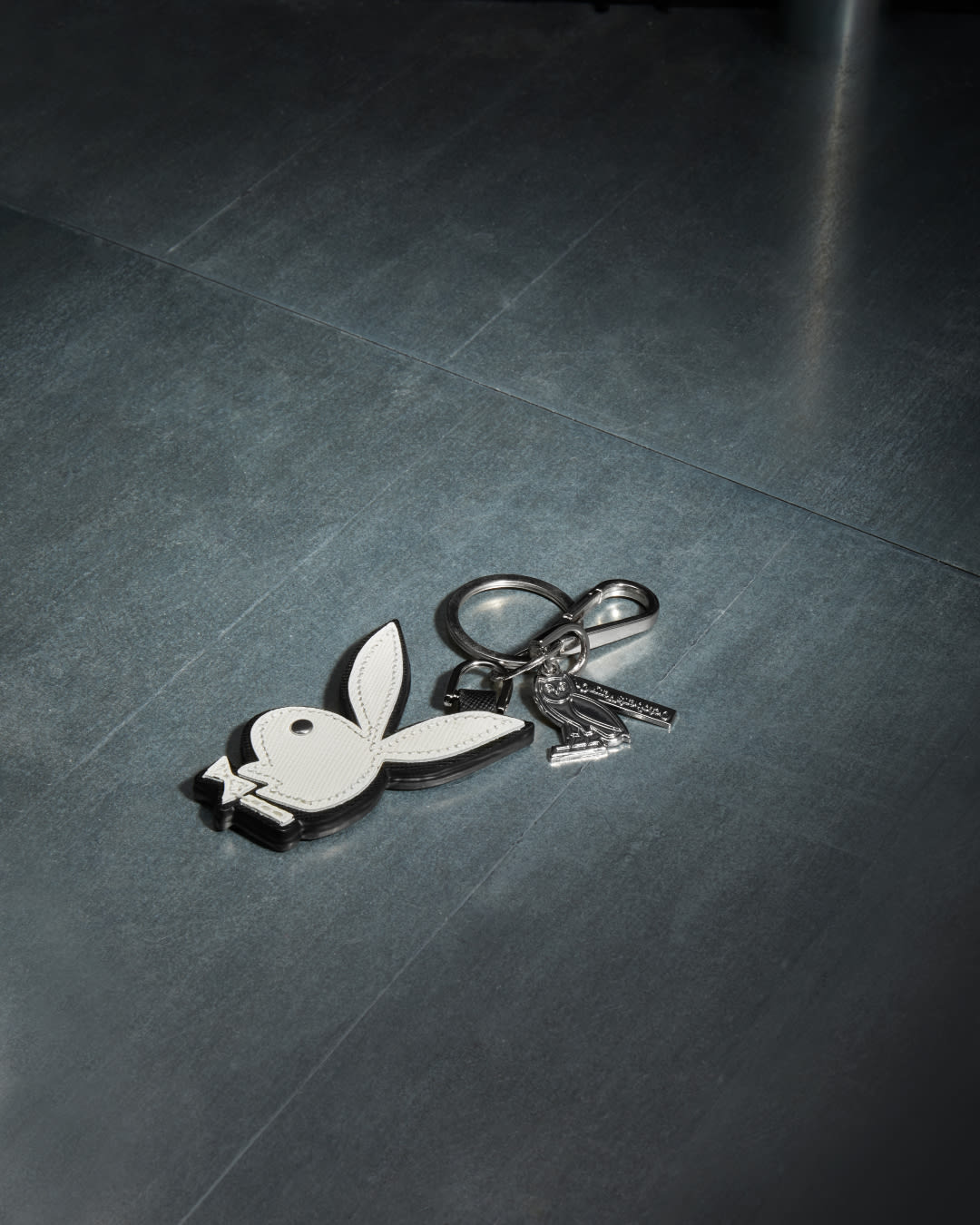 A keychain of the Playboy bunny logo.
