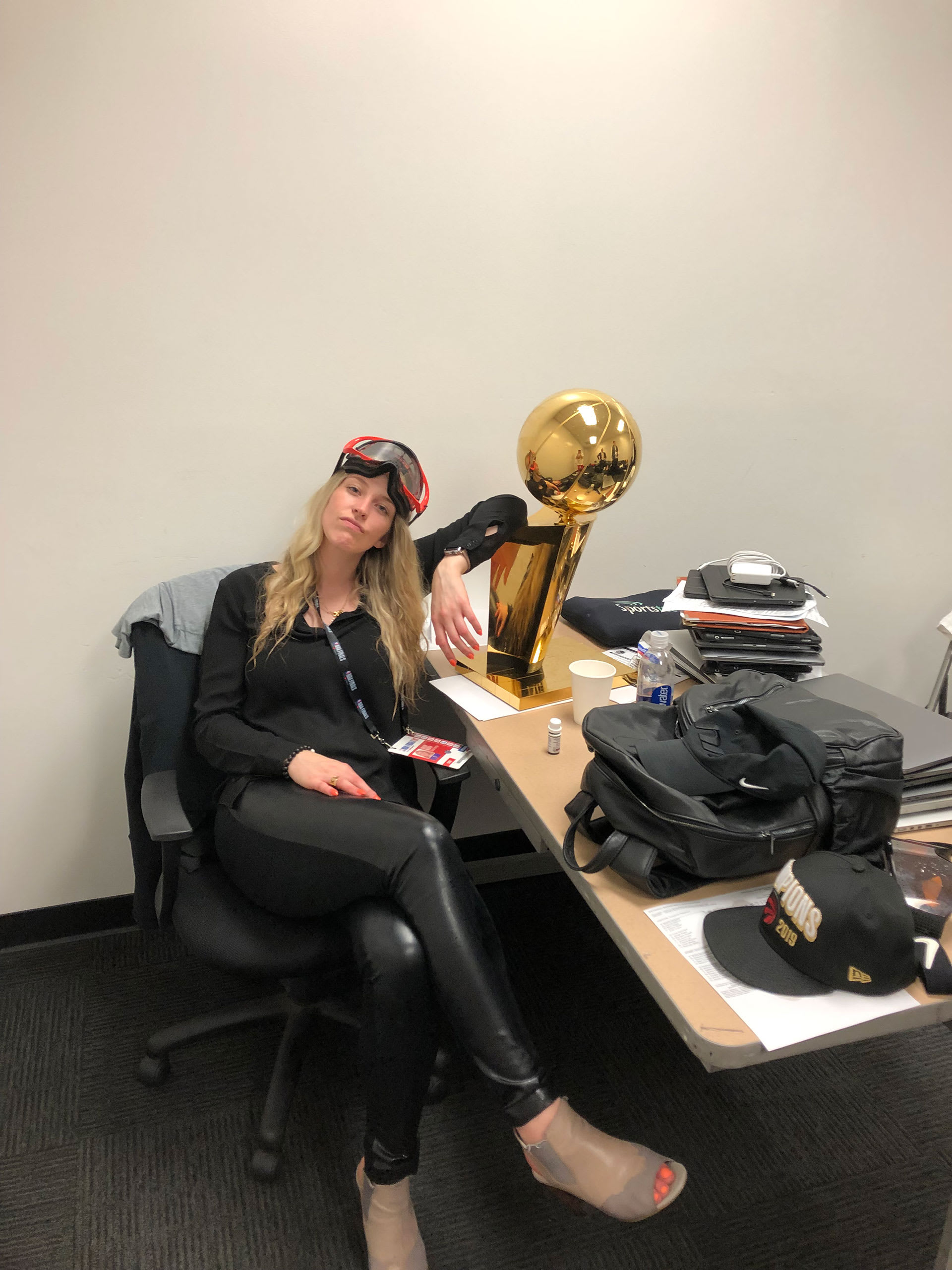 Toronto Raptors Shelby Weaver poses with Larry O&#x27;Brien trophy.