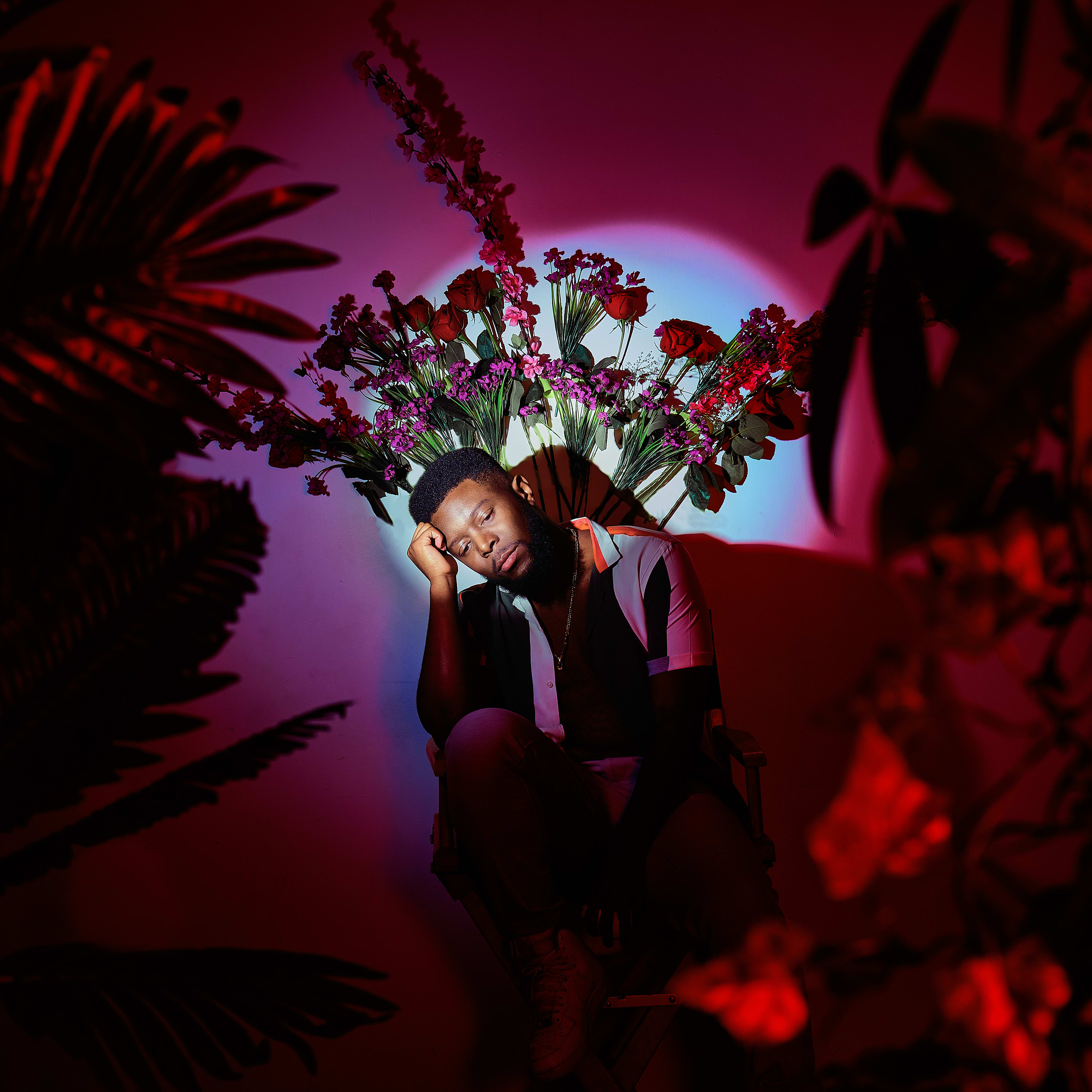Lexxicon on the cover of his album with flowers