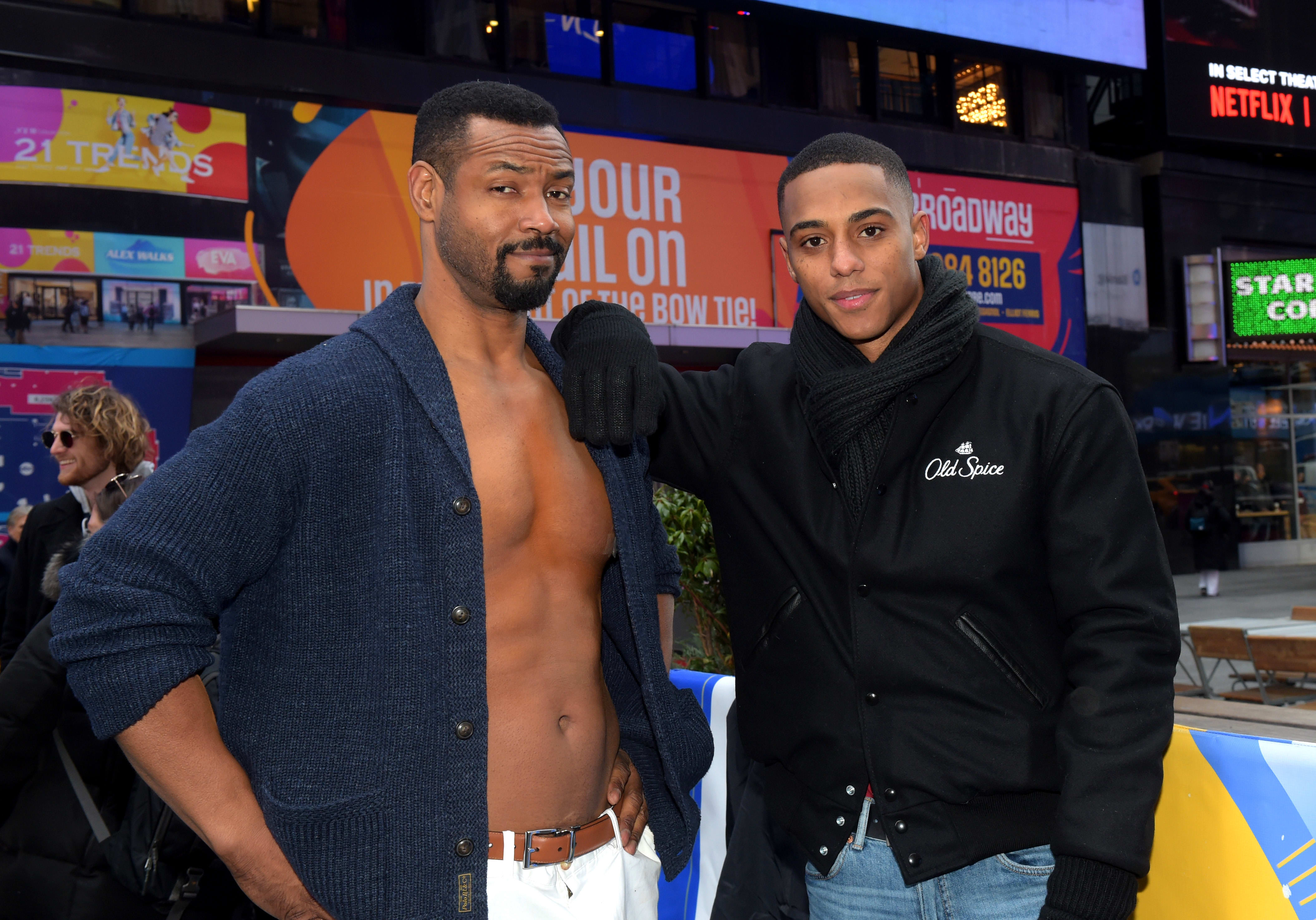 Isaiah Mustafa and Keith Powers in Times Square
