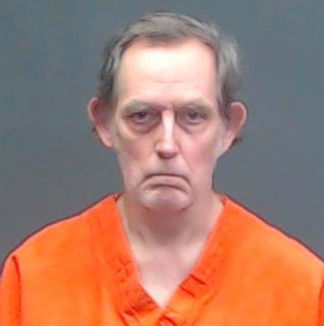 A man's mugshot is shown after a body is found