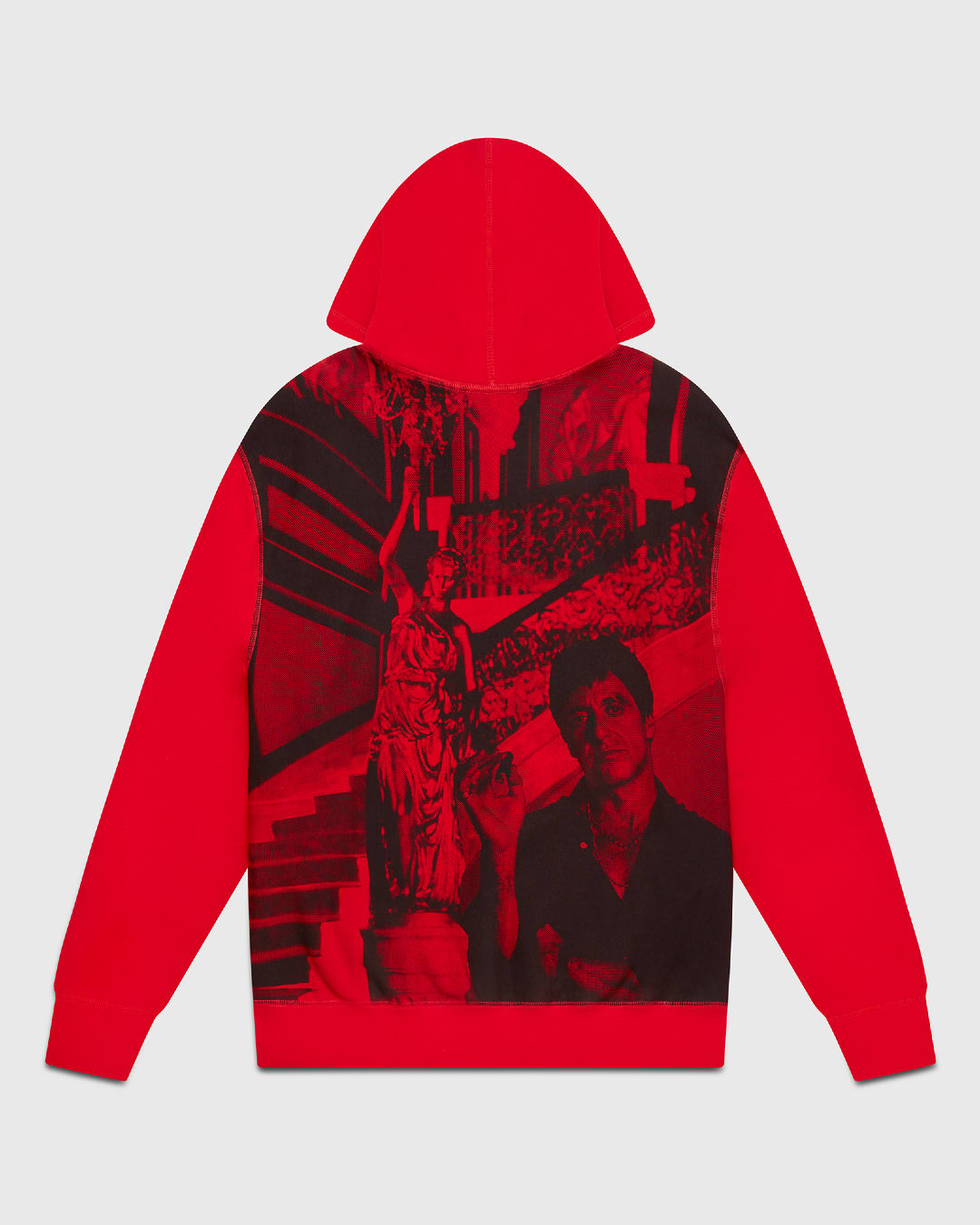 A red hoodie picturing Tony Montana (Al Pacino) smoking a cigar.