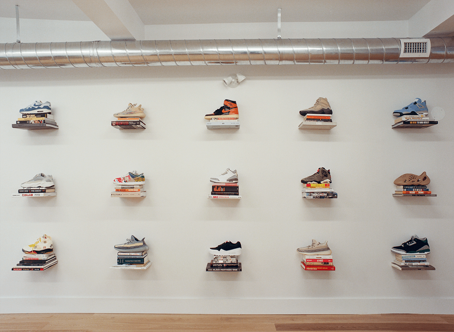 A wall of sneakers at the KickBack Gallery.