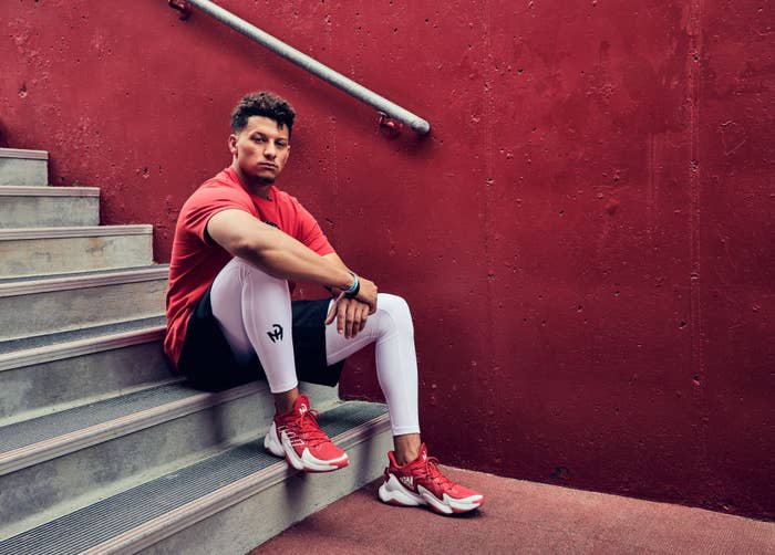 Pat Mahomes posing for a picture with Adidas
