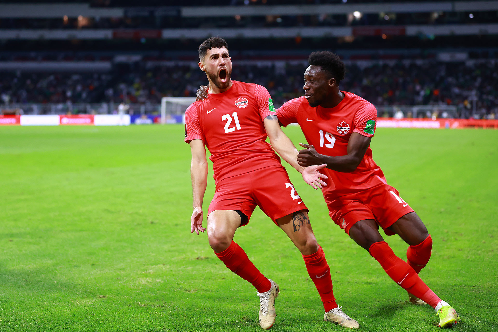 Jonathan Osorio celebrates goal with Canada&#x27;s national soccer team.