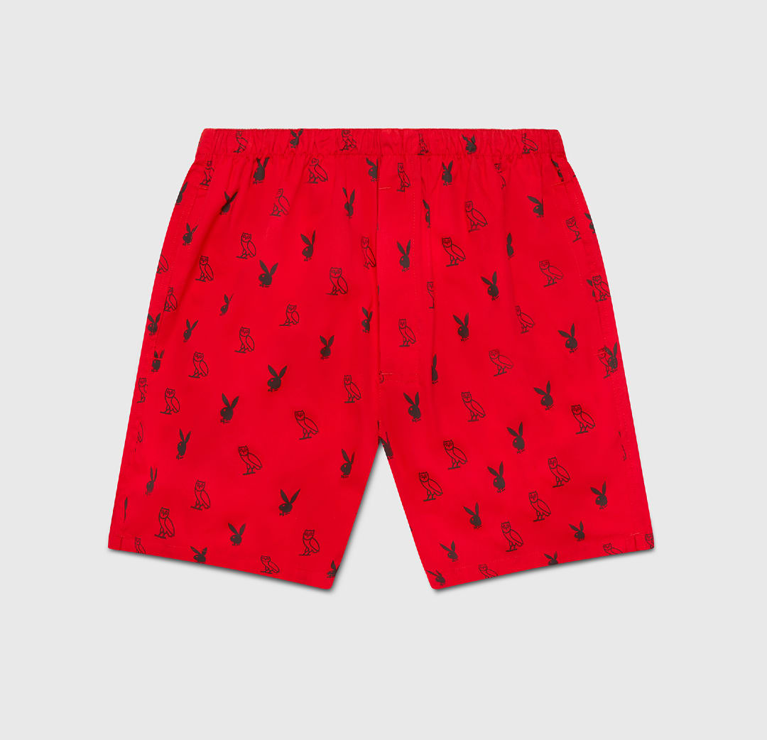 A red pair of boxers with the Playboy and OVO logos.