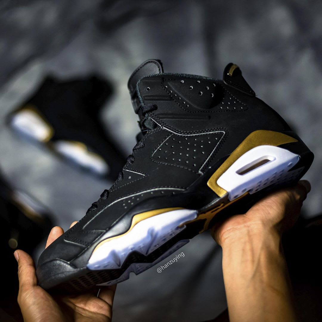 Black and shop gold jordan 6s