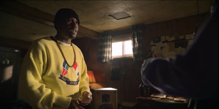 Raekwon Wearing a Polo Cross Flags Sweater In Wu-Tang: An American Saga