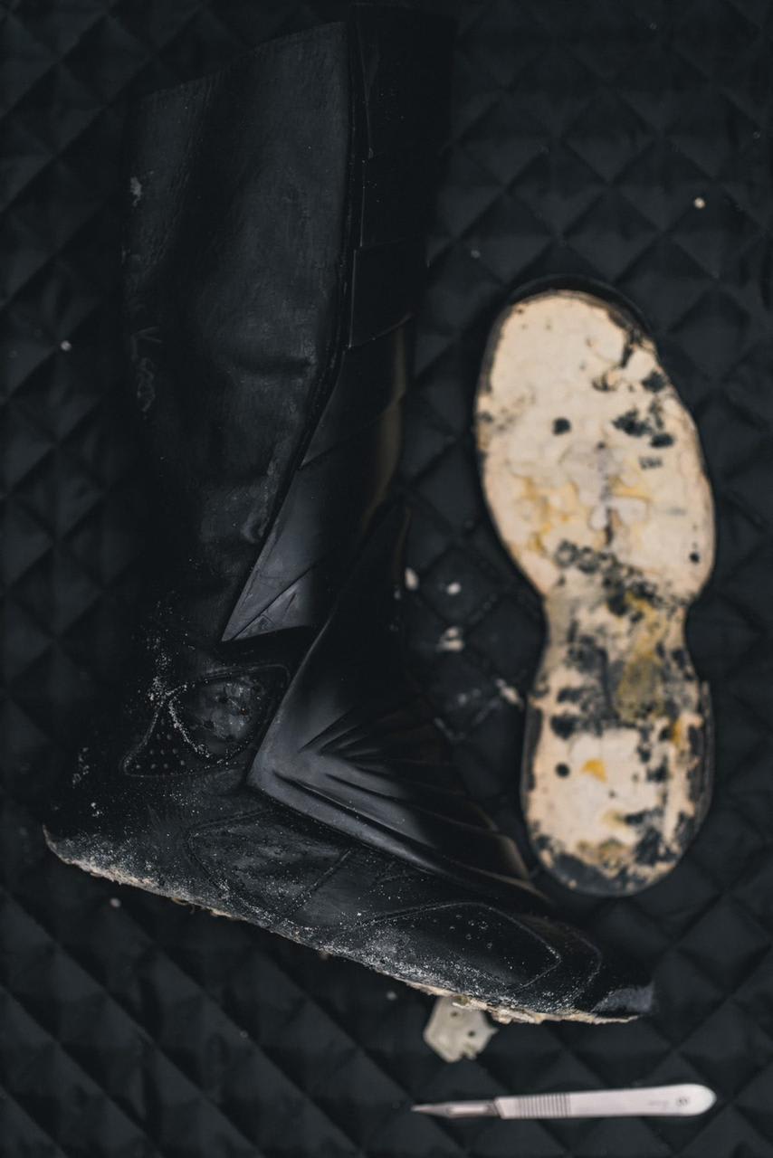 The Batman Air Jordan 6 boot with its crumbled sole removed