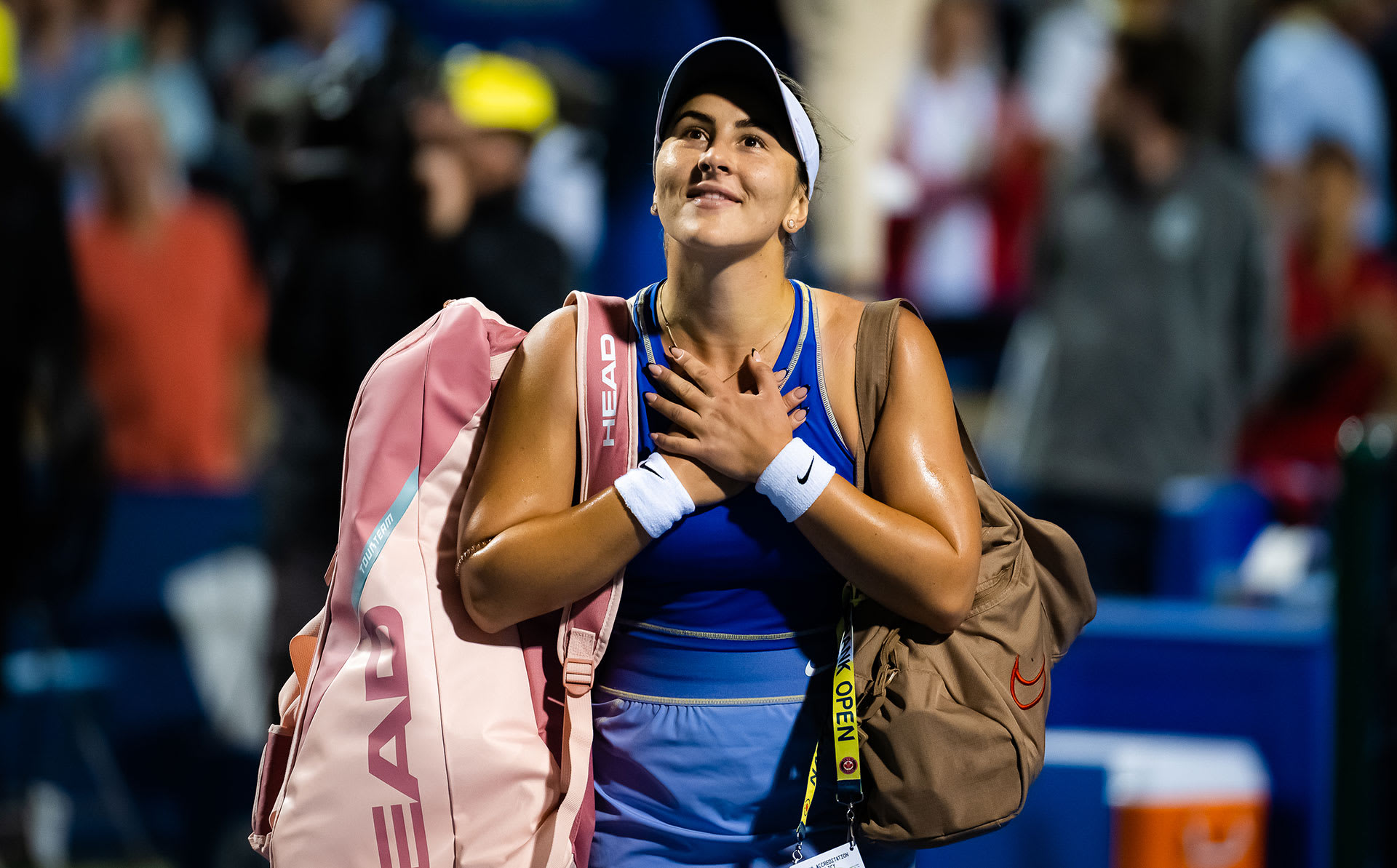 Bianca Andreescu of Canada walks off the court after losing to Qinwen Zheng of China
