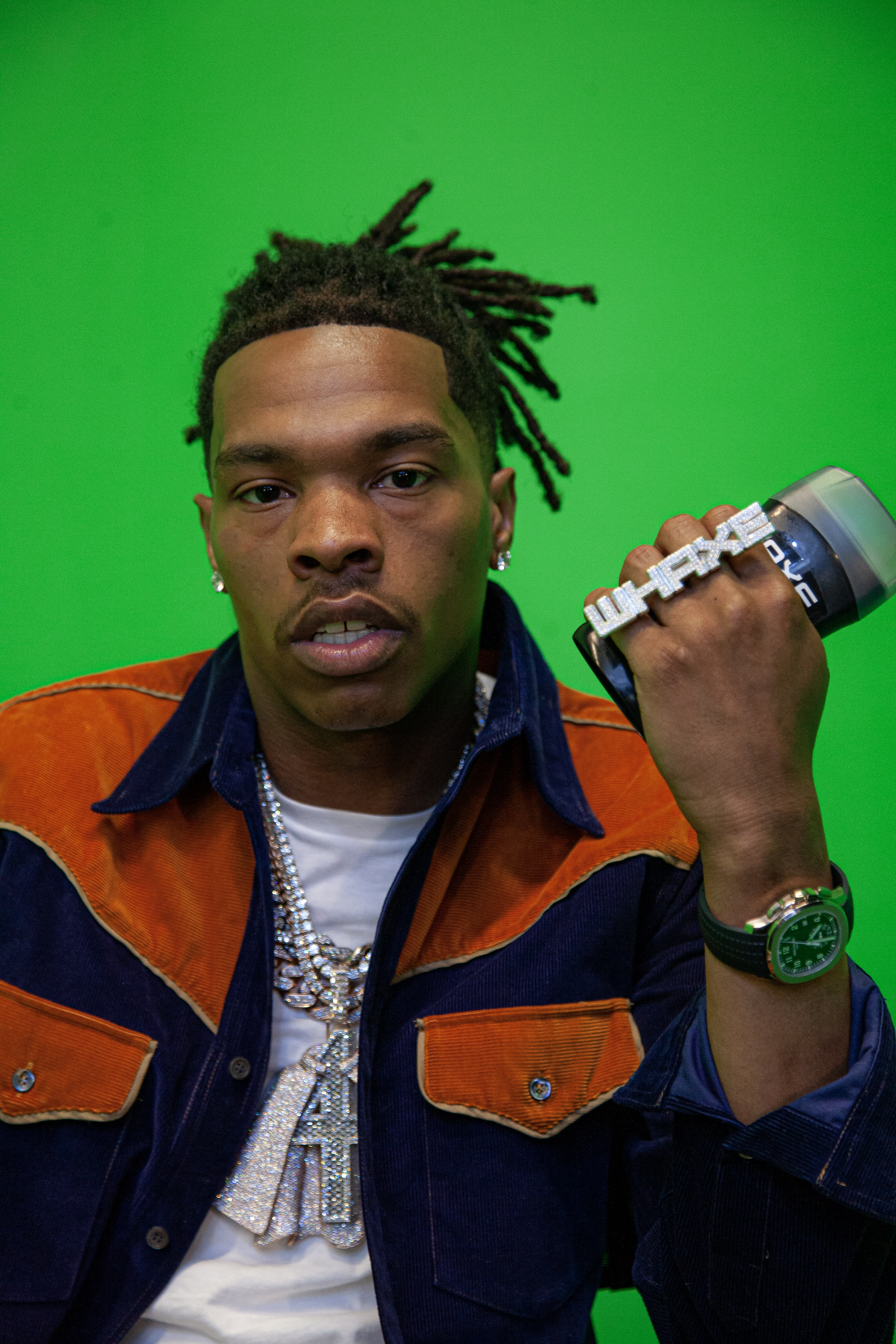 Photo of Lil Baby promoting new AXE body spray products