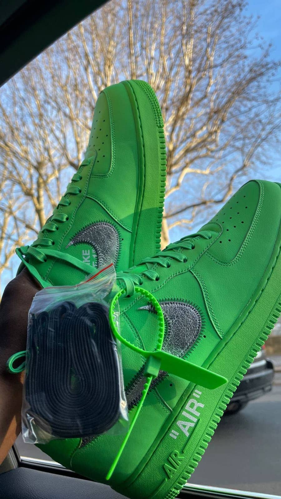 Nike Air Force 1 Hi sneakers in off-white and green