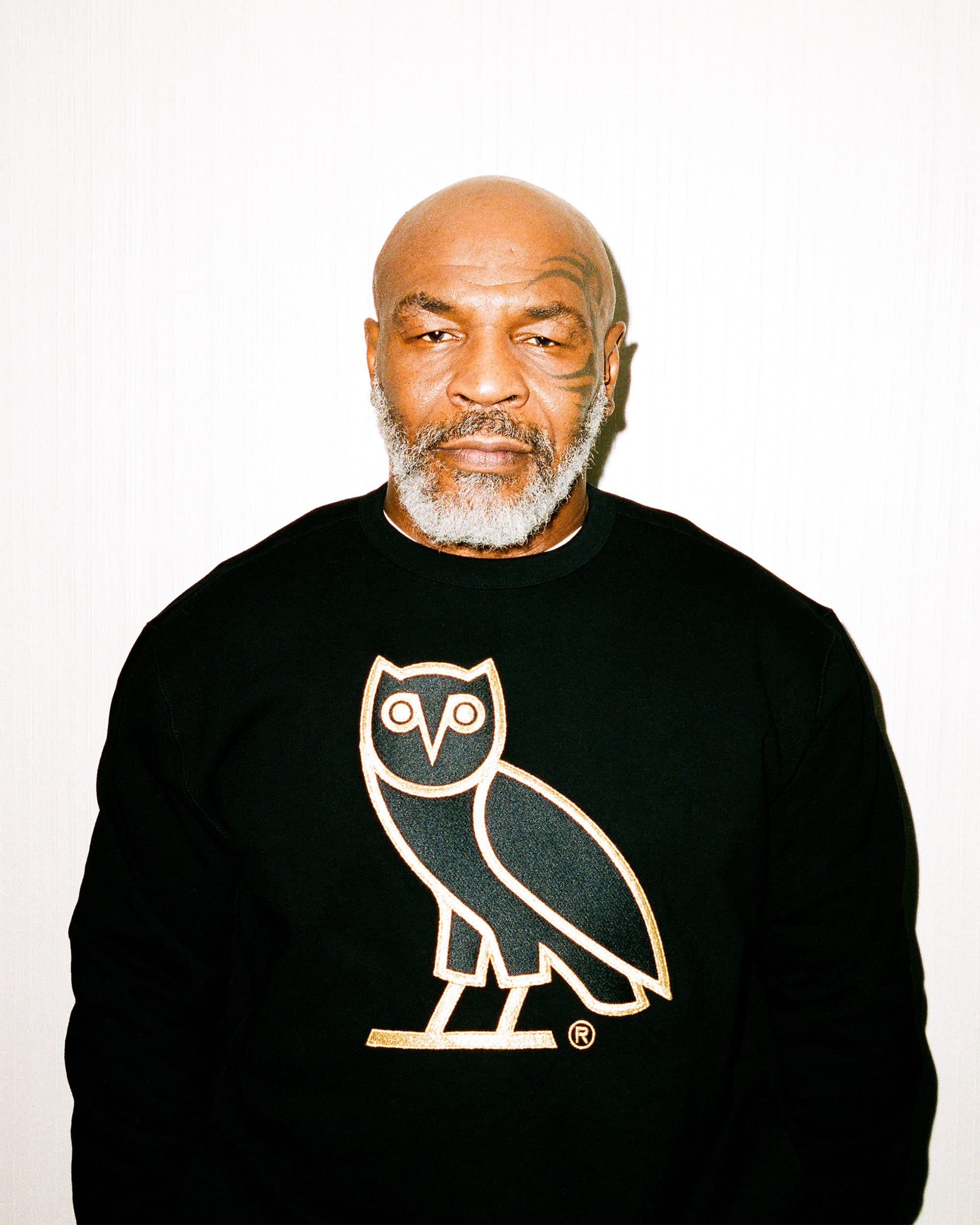 Mike Tyson poses in OVO sweater