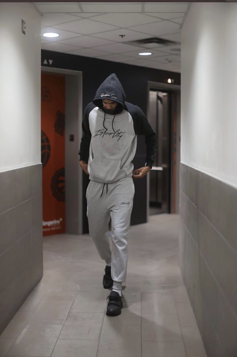 Toronto Raptors Dubber Don wearing In Your City streetwear in the NBA tunnel