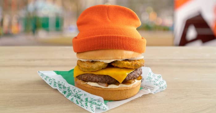 A&amp;W and Matty Matheson&#x27;s Best Burger Ever Burger wearing an orange toque
