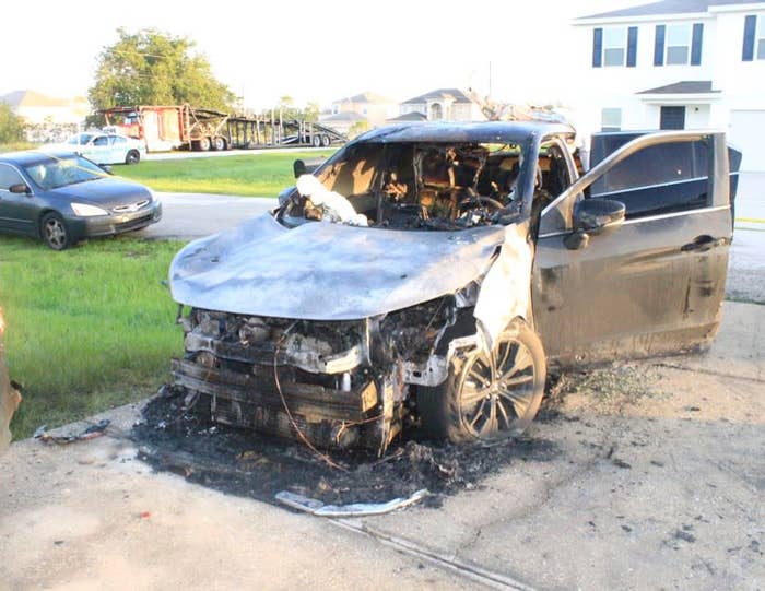 Photo of car that was burned by R. Kelly&#x27;s associate Michael Williams to intimidate accuser