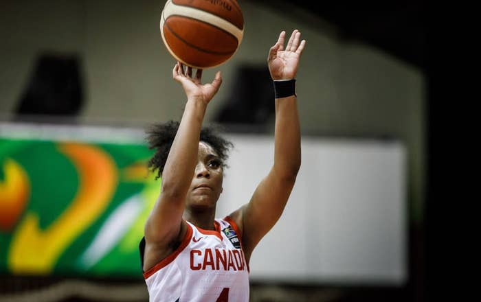 Shayeann Day-Wilson playing basketball