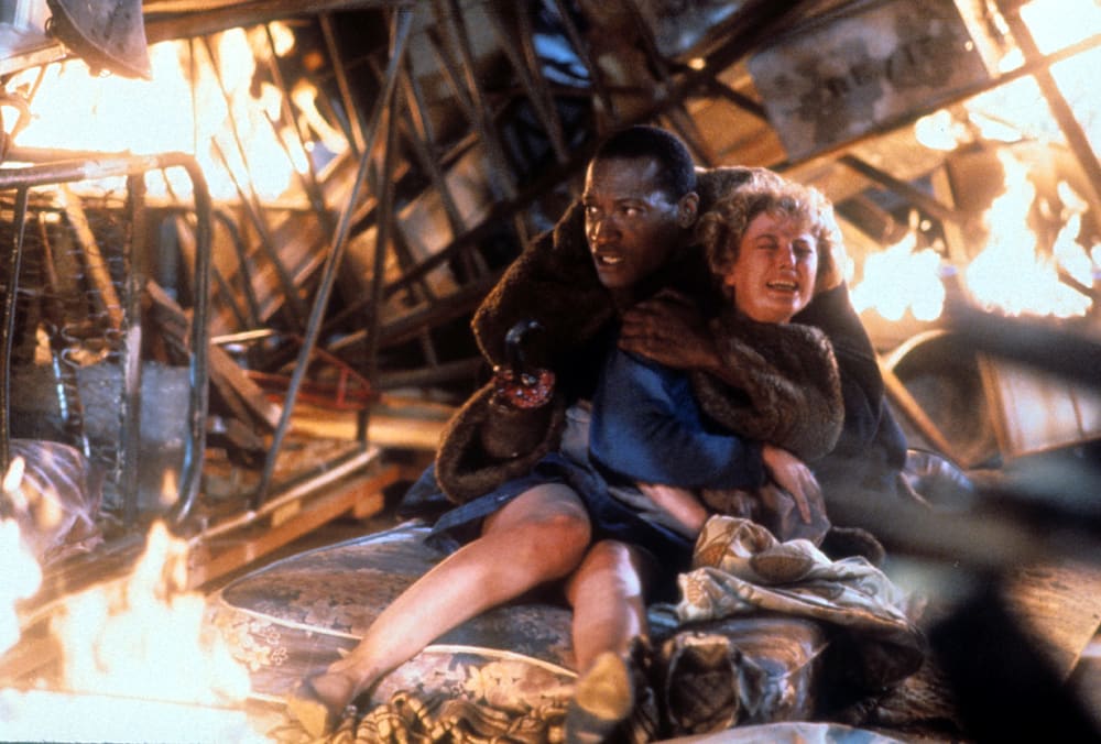 Tony Todd holds onto Virginia Madsen in a scene from the film &#x27;Candyman&#x27;, 1992.