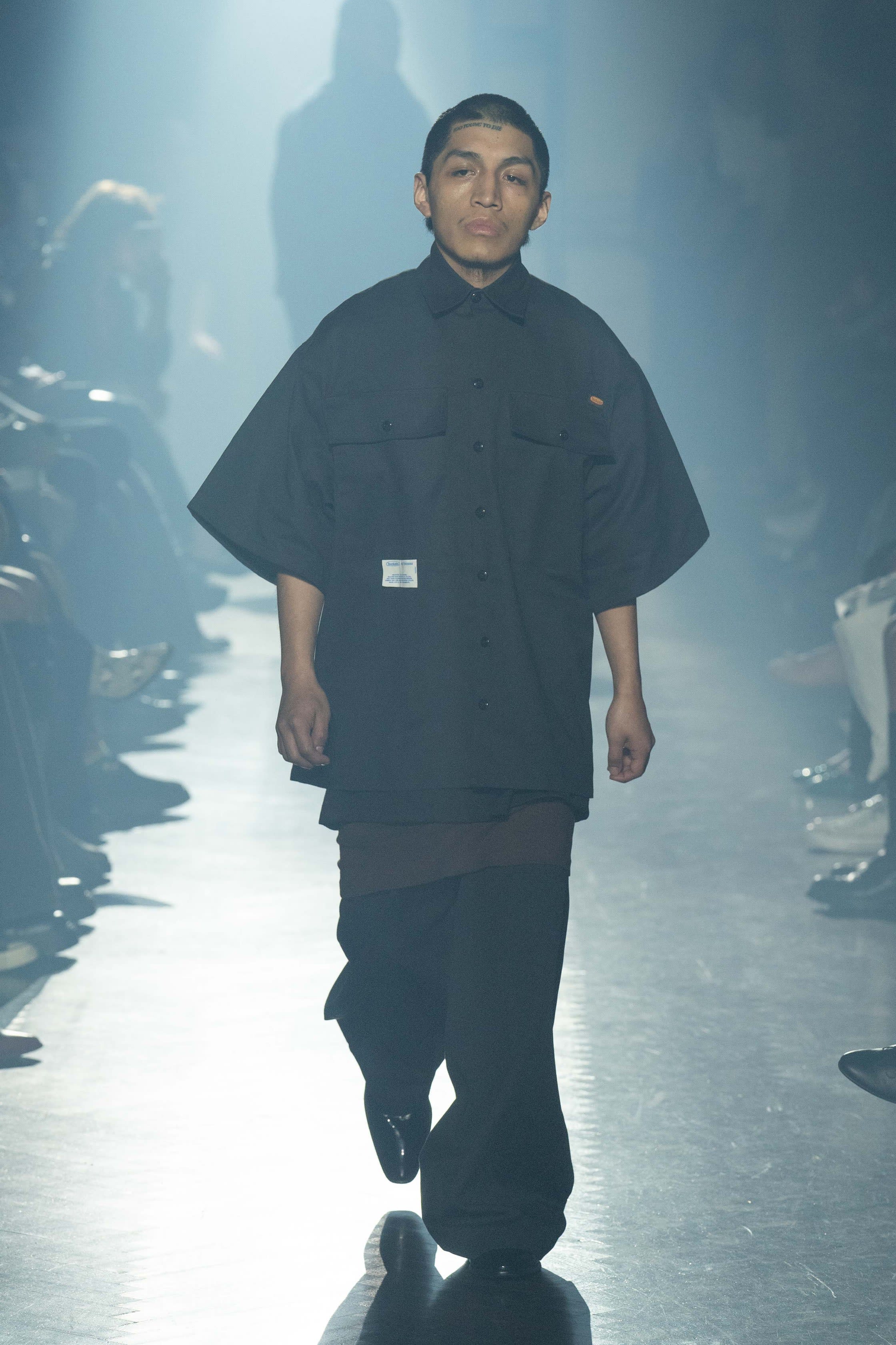 A model is seen wearing Dickies pieces