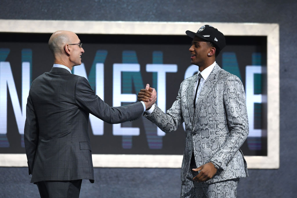 Nickeil Alexander-Walker and Adam Silver shaking hands at the 2019 NBA draft.