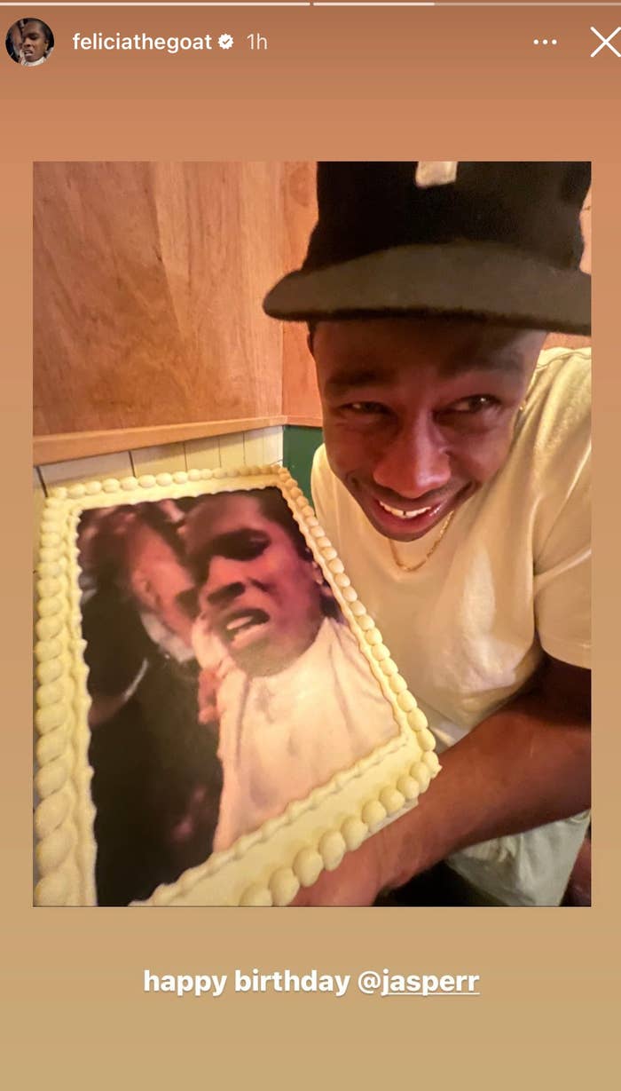 Tyler the Creator is pictured with a cake