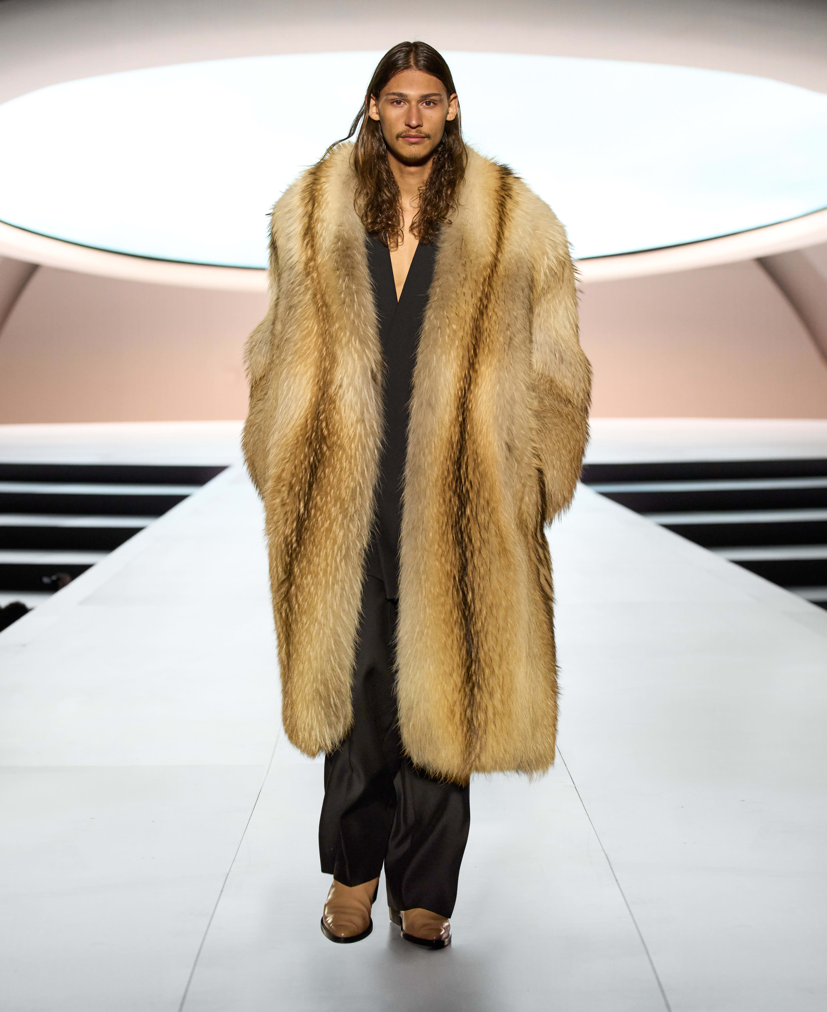 Designer Jerry Lorenzo posing outside of the Vetements runway show