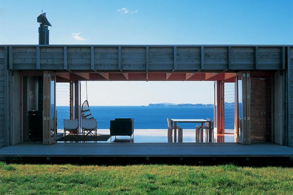 This amazing New Zealand beach house is like the perfect sun porch during the day...
