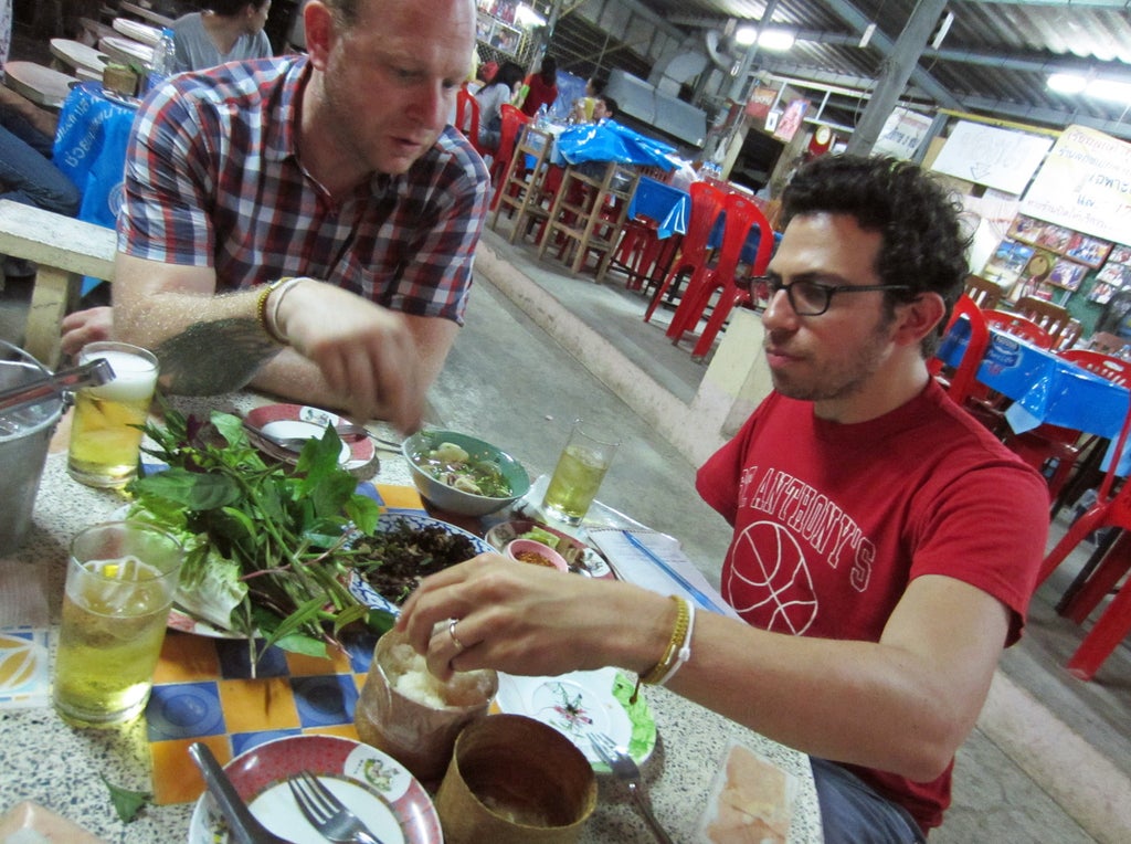 Chef Andy Ricker (left) and JJ Goode (right) on a cookbook research trip in Thailand.