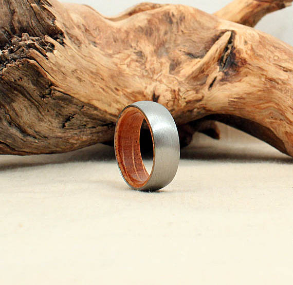 The inner liner of this ring is made from a white oak whiskey barrel. And while the whiskey smell is sealed with finish, you know the goodness is still there. ($245)
