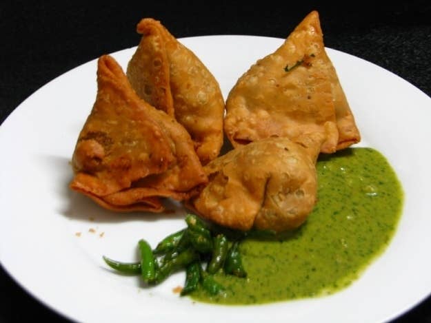 What It Is: A fried or baked triangular snackfood made of a potato stuffing, usually also containing onions and peas, served with a mint chutney.Perfect For: Literally anytime, anywhere.Feels Like: Home.