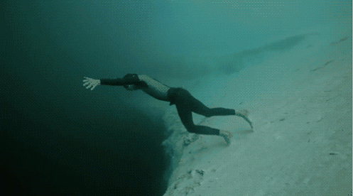 Guillaume Nery can hold his breath, while swimming, for almost 8 minutes. He's swum down to depths of over 100m, the point at which the light dims. There's not much bolder than disappearing into the depths of water, alone.