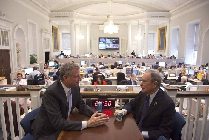 De Blasio and Bloomberg at City Hall.