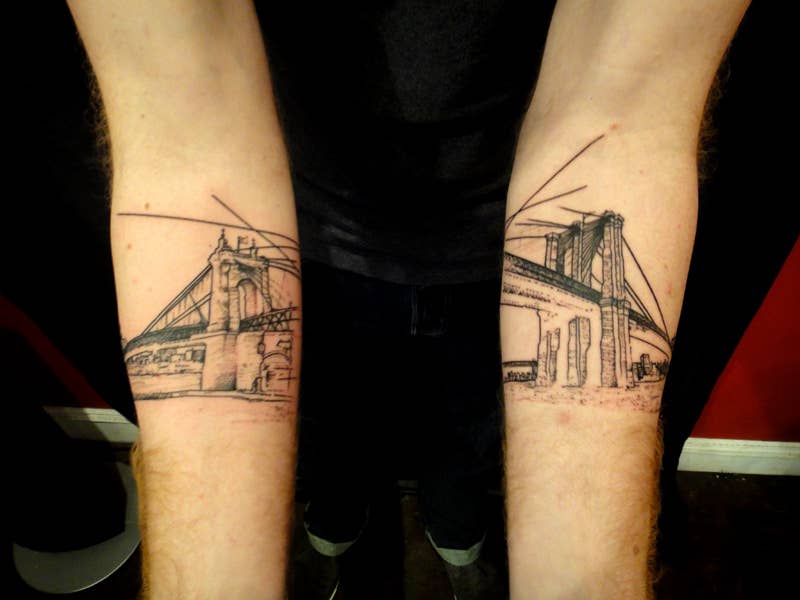 new york skyline forearm tattoo