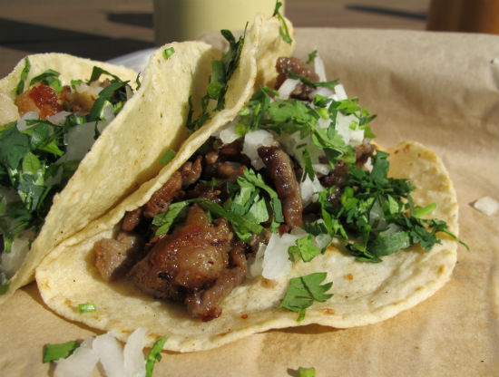 "Bistec" tacos are as common as "pastor" tacos. It's a thin steak with no condiments and very little fat, chopped into tiny, tasty bits. Indulge your inner food lover with these.