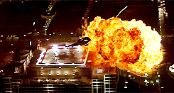 "I see a ton of smoke and firetrucks and several firemen and flames coming out the windows. Is the building on fire?"