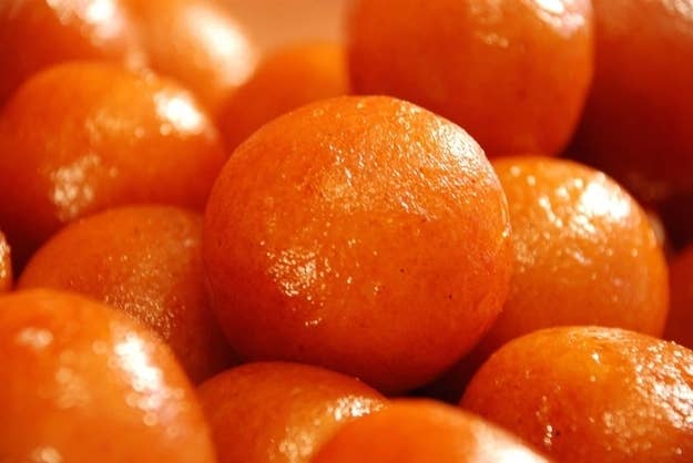 What Is It: Small balls of dried milk, slow cooked and boiled in a sugar syrup.Perfect For: When you've already had a delicious meal and have just enough room for dessert.Feels Like: Playing hide-and-go-seek with your cousins at a family reunion way, way past your bedtime.