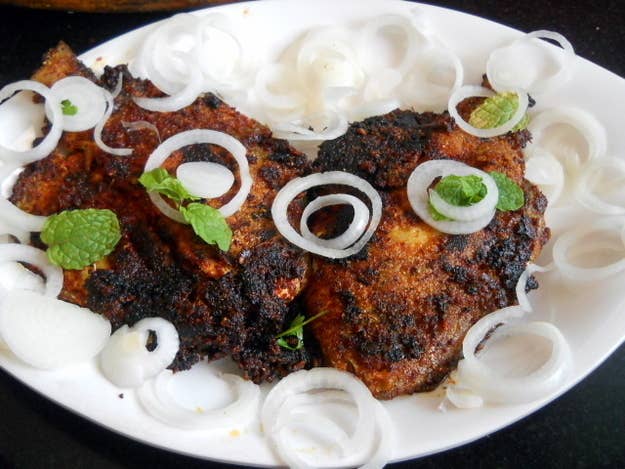 What It Is: A spicy paste made of chilies, tamarind, and garlic (amongst other spices) is rubbed onto whole fish which are then fried.Perfect For: Satisfying your seafood craving and spice craving all at once.Feels Like: Sitting on a beach in Goa, watching the waves roll in.