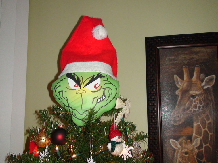 The Tree Topper Turns Your Christmas Tree Into The Grinch