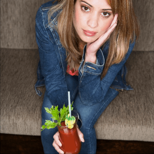 With a lifesaving Bloody Mary to squash that pesky "headache."