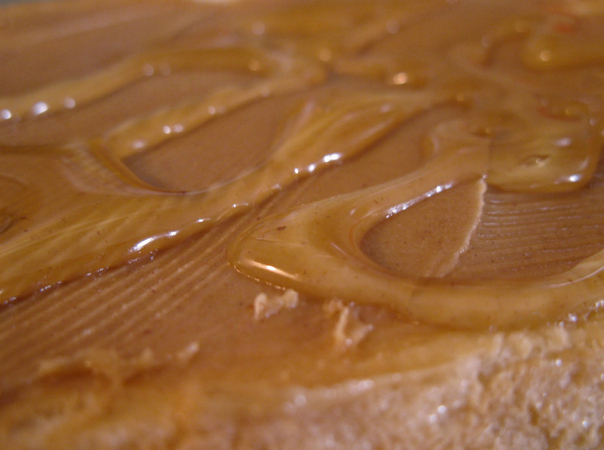 That's right, merely drizzle a little honey over the creamy (or chunky) peanut butter for a simple, yet delicious sandwich. Warming the sandwich in the microwave gives it a warm, crunchy taste.