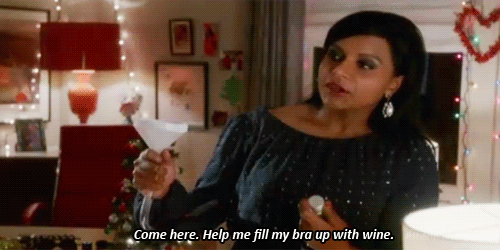 Her clothes aren't just pretty, they're multifunctional. Dr. Lahiri has solved the ultimate outfit conundrum: how to make the office holiday party outfit cute and a receptacle for booze.